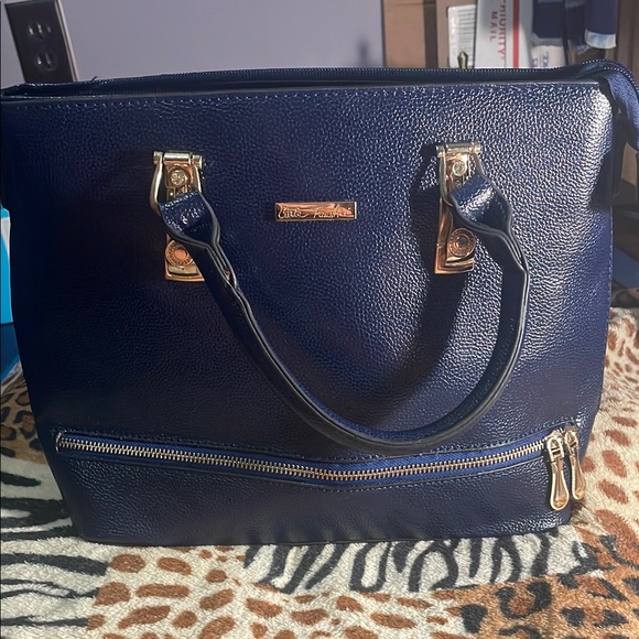 Carla Faustini Handbags - Carla Faustini Blue Textured Leather Convertible Purse